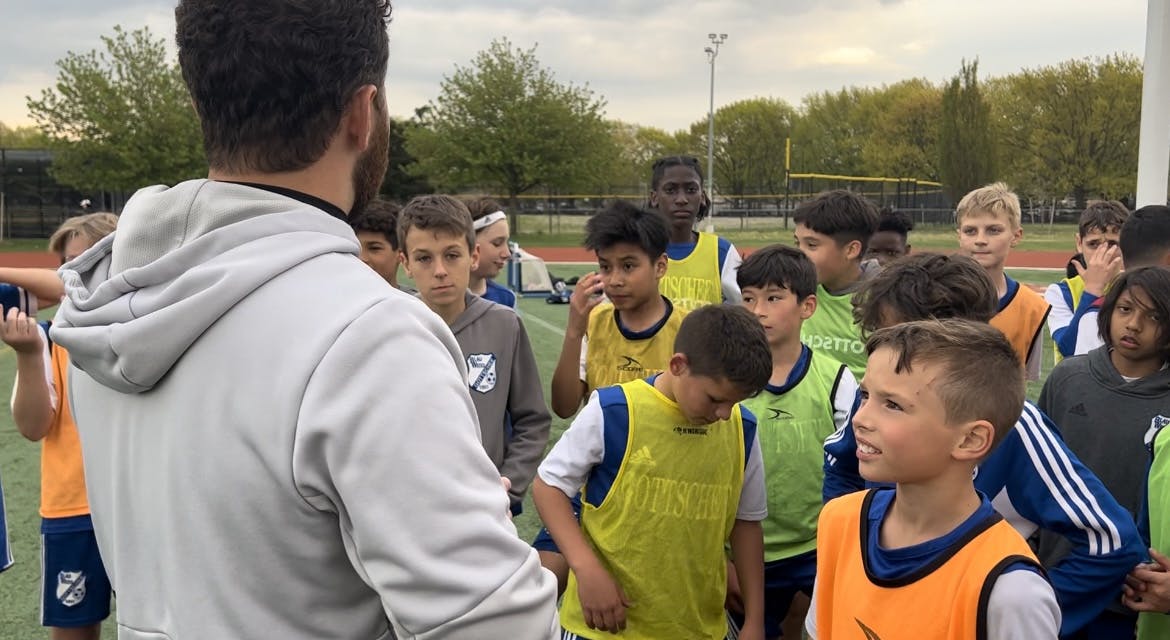 Zone 1 Coach teaches kids how to play soccer